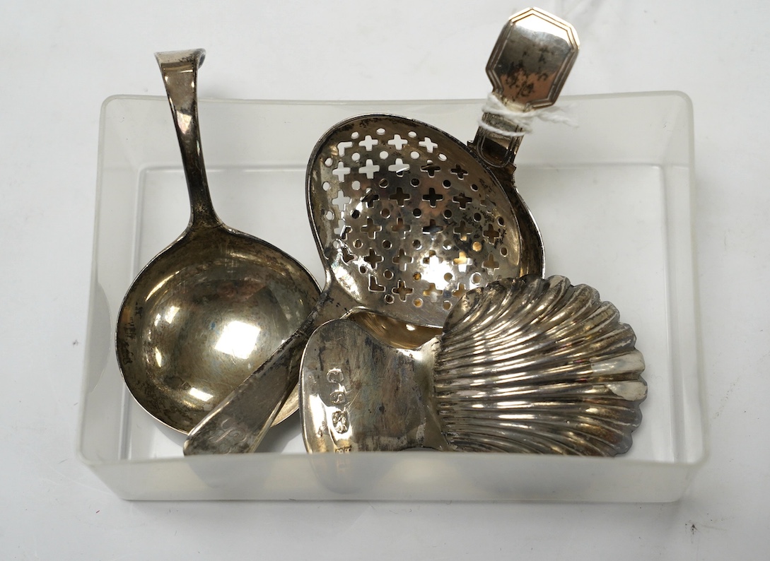 Four assorted silver caddy spoons, including Peter & Ann Bateman, London, 1793, 59mm, reeded handle, Joseph Wilmore?, Birmingham, 1807, pierced bowl, Alice & George Burrows, London, 1809 and curved handle John Lambe, Lon